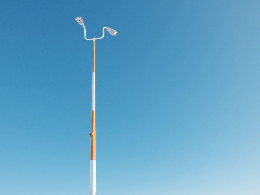 Winnipeg Wedding Photographer Michael Scorr captures a lone light post against a bright blue sky.